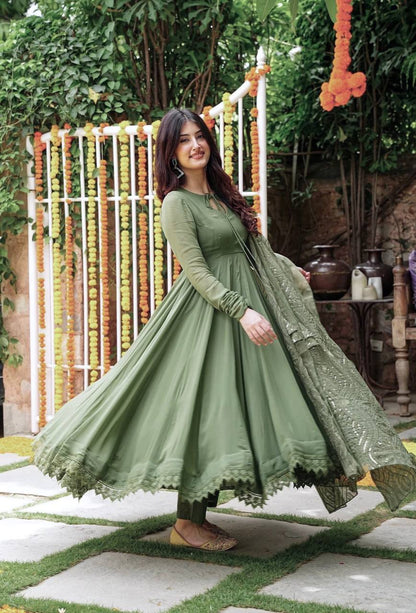 Ceremony Wear Mehndi Color Gown With Work Dupatta