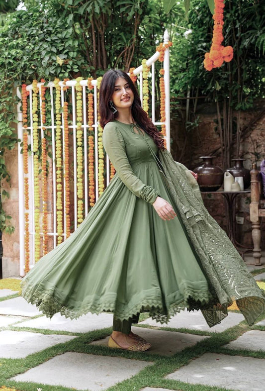 Ceremony Wear Mehndi Color Gown With Work Dupatta